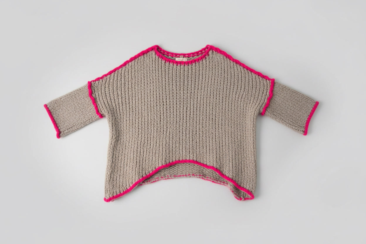 Beige and pink knit poncho style jumper