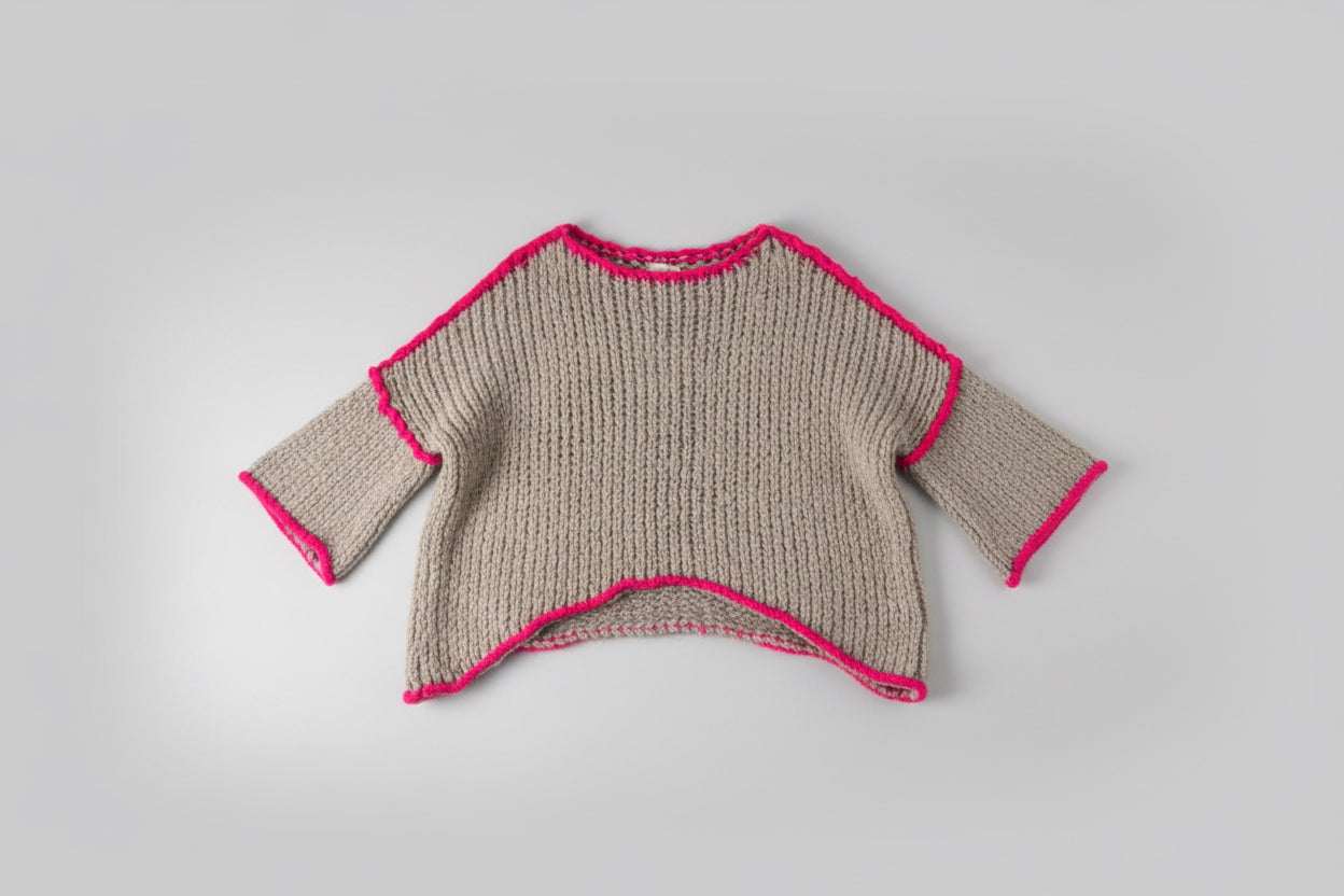 Beige and pink knit poncho style jumper